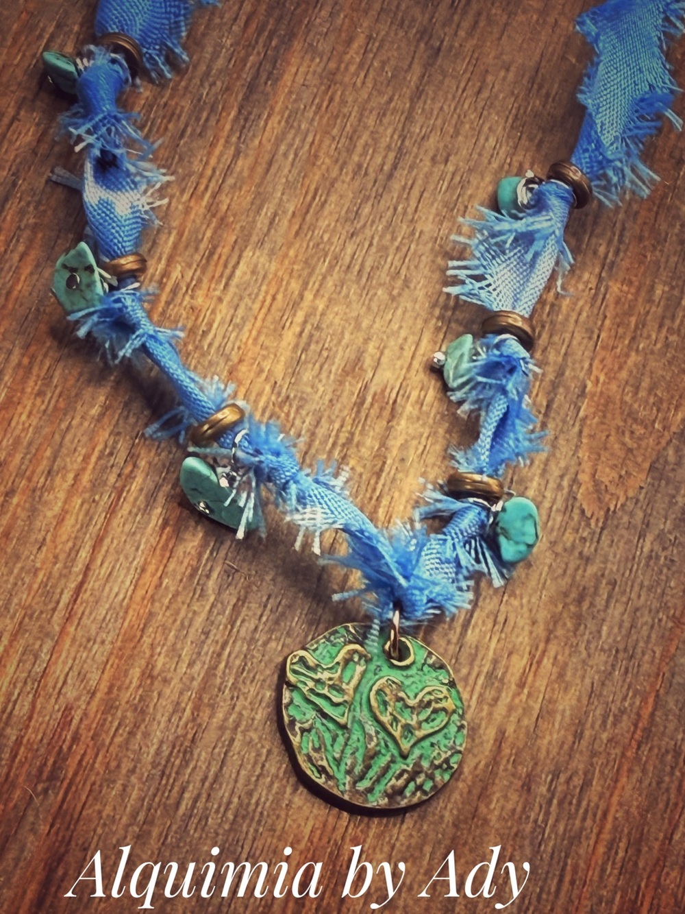 Turquoise Heart Medallion Necklace on Blue Ribbon